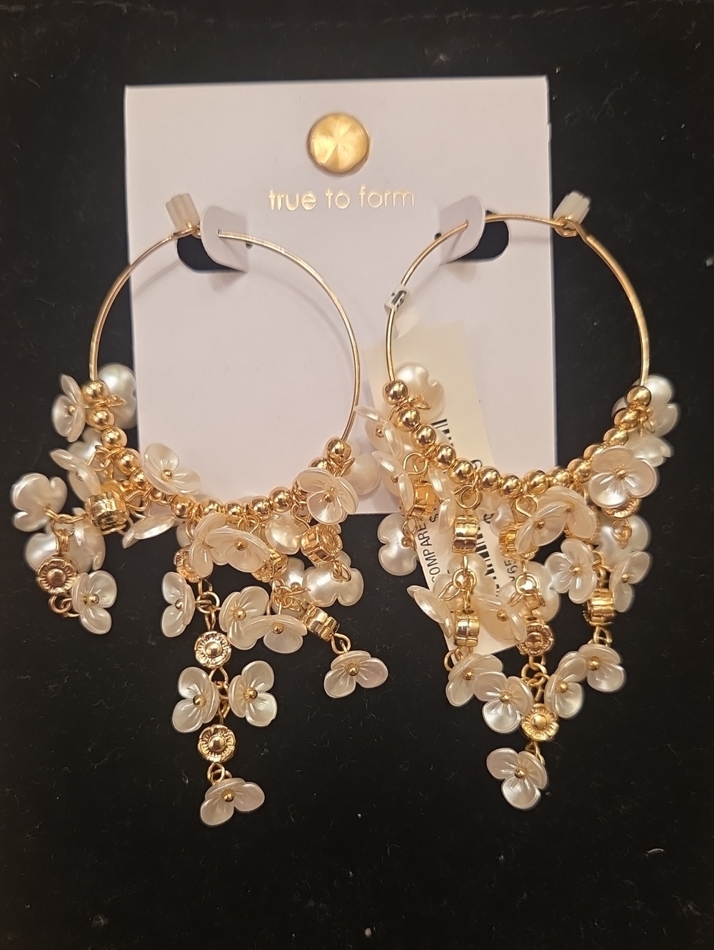 Gold Hoop Earrings with White Flower Charms